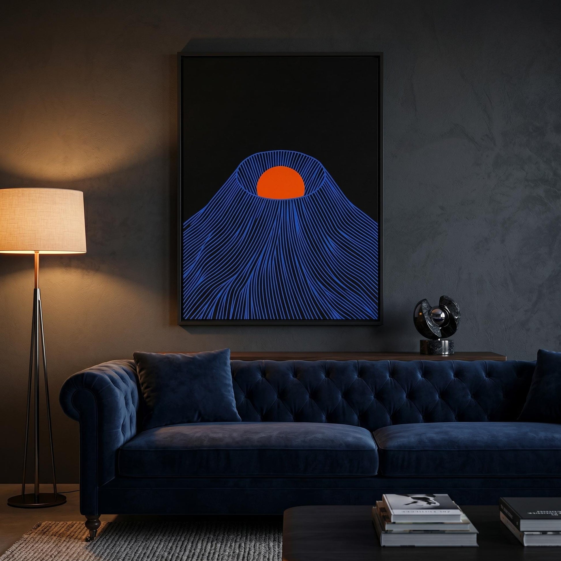 Framed Japanese mountain poster with orange sun, 
dark minimalist wall art in concrete interior