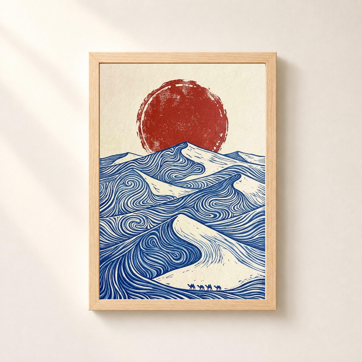 Desert dunes print red sun camels, blue swirling lines on cream with camel caravan, linocut style wall art