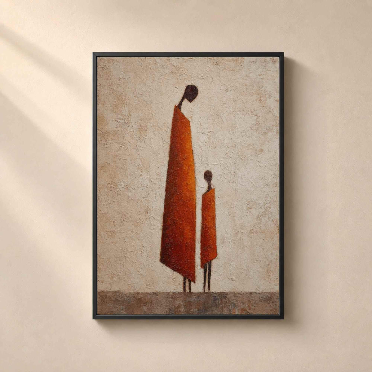 Affiche mère et enfant dans un cadre en métal noir fin sur un mur beige, mère et enfant africains façon peinture texturée terracotta.